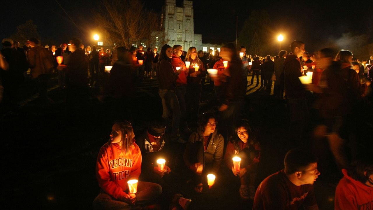 Mourners in Blacksburg, Virginia, hold a candlelight vigil on Virginia Tech's campus in 2009, a year after 32 people were killed. 