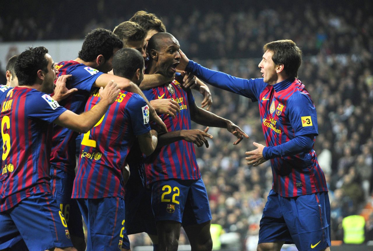 The 32-year-old has continued to be a key player for the Catalan club. Here he is surrounded by his teammates after scoring in a win against archrivals Real Madrid in January 2012.