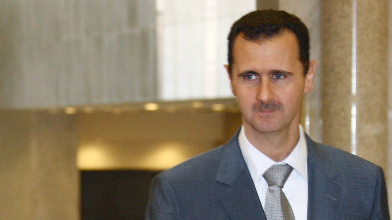 Syrian President Bashar al-Assad, seen in a file photo from July 6, 2008, says if his government falls, other countries in the region could suffer.
