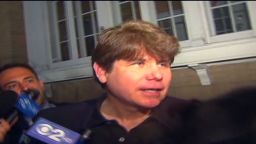 vo blagojevich departs house for prison_00000607