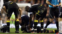 LONDON, ENGLAND - MARCH 17: Fabrice Muamba of Bolton Wanderers lies injured on the pitch during the FA Cup Sixth Round match between Tottenham Hotspur and Bolton Wanderers at White Hart Lane on March 17, 2012 in London, England. Fabrice Muamba suddenly collapsed and emergency services gave CPR treatment on the pitch, before taking him off on a stretcher, still unconscious. (Photo by Clive Rose/Getty Images)