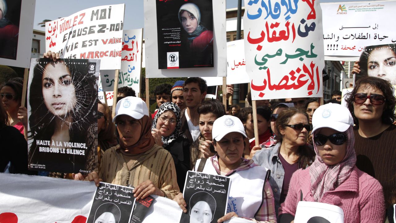 Women protesting in Rabat hold posters of Amina Filali, 16,who was forced to marry the man alleged to have raped her.