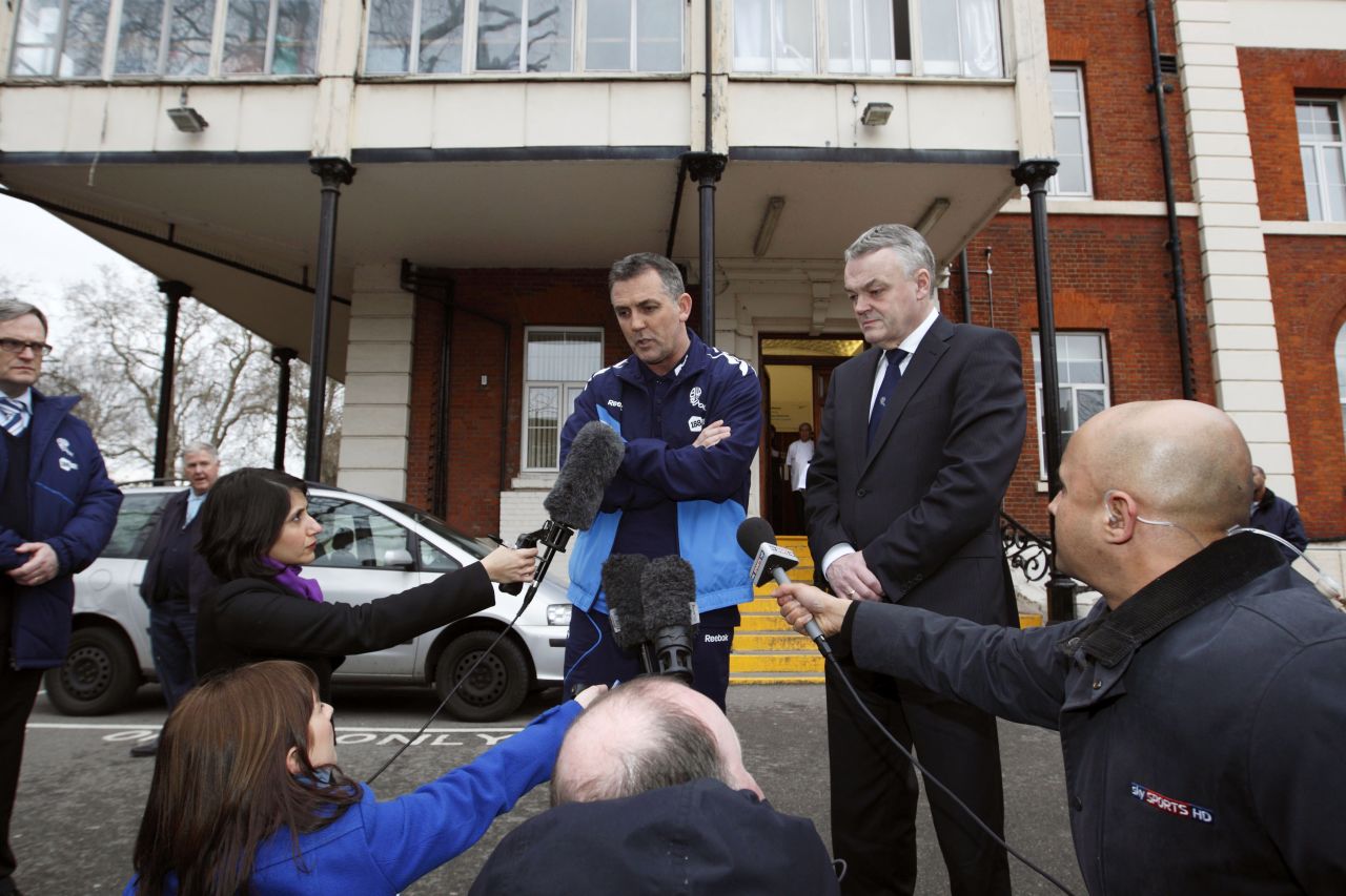 Bolton manager Owen Coyle (left) and chairman Phil Gartside outside the London Chest Hospital where Muamba is being treated.