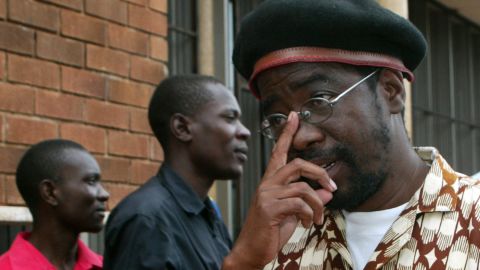 Zimbabwean activist Munyaradzi Gwisal leaves court in Harare Monday after being convicted of planning Egypt-style protests.