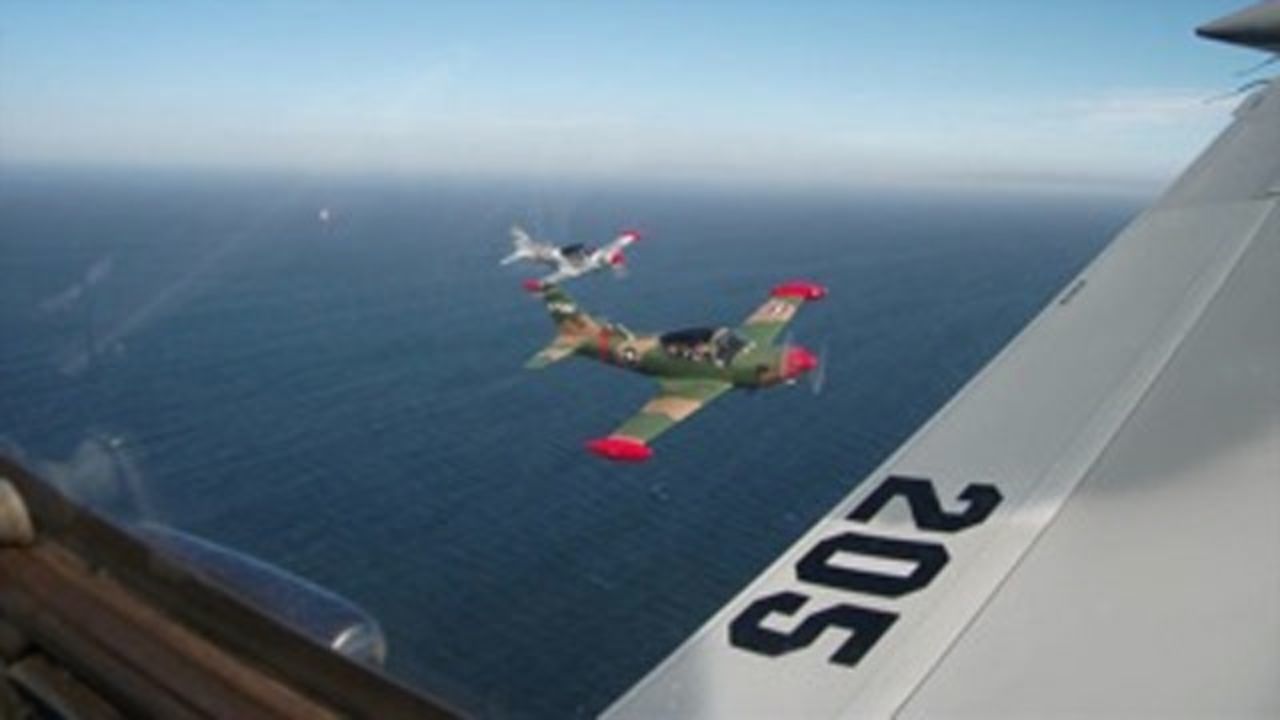 The view from the cockpit of a SIAI-Marchetti fighter plane ahead of an "executive dogfight."