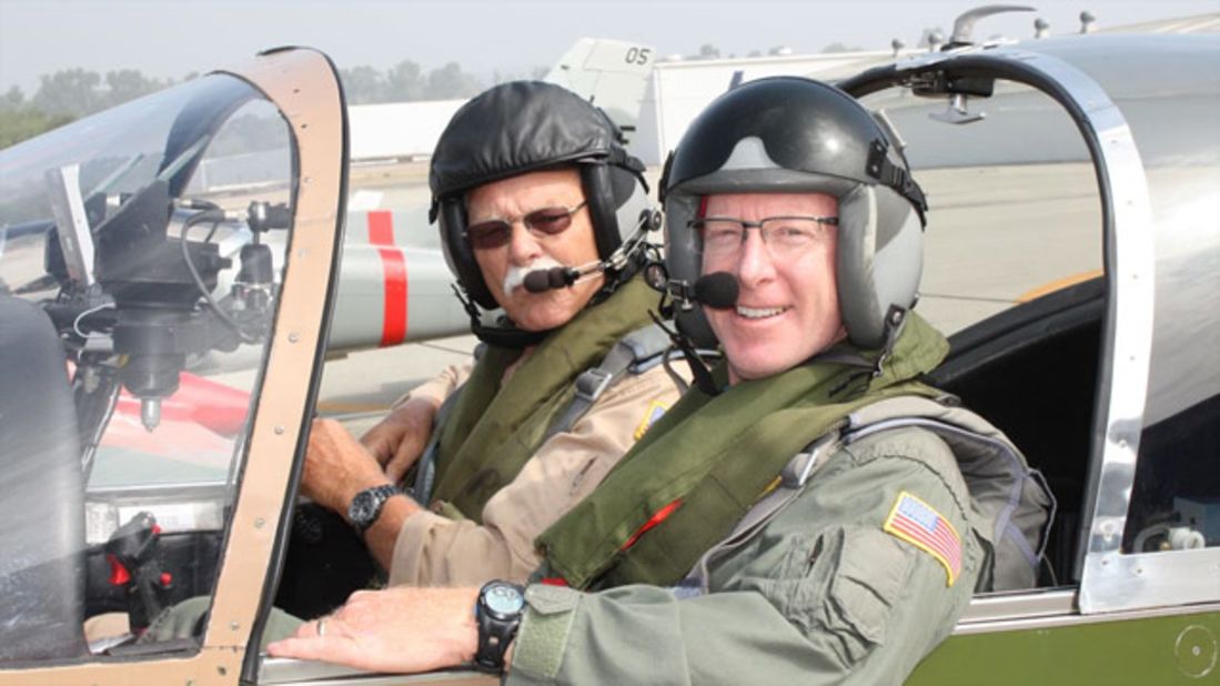 A participant prepares for take off next to their instructor at Air Combat USA.