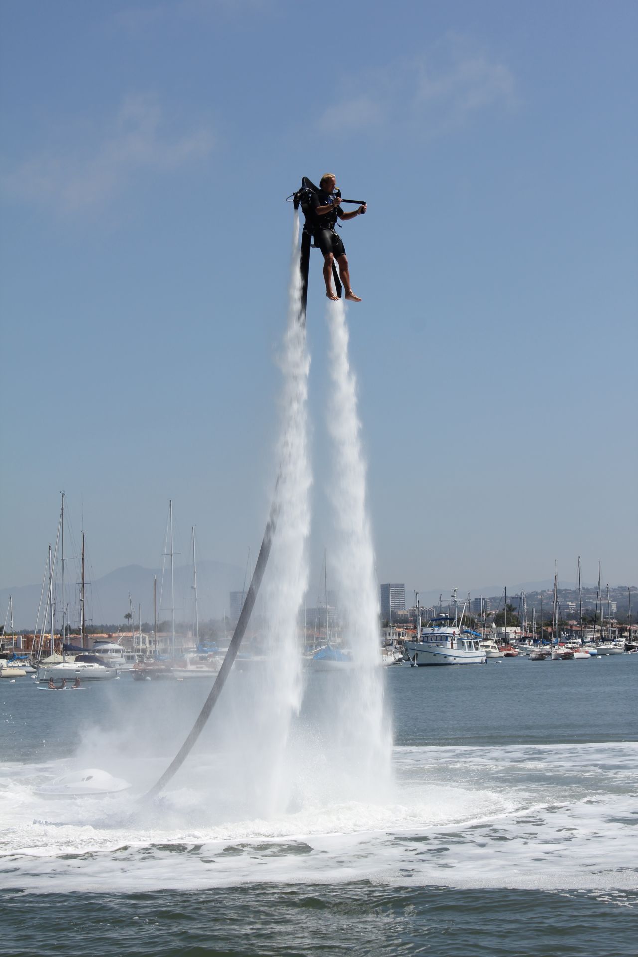 A man tries out the Jetlev water jet pack. First-time "flyers" can reach up to 15 feet; the jet pack can propel flyers a maximum of 30 feet high.