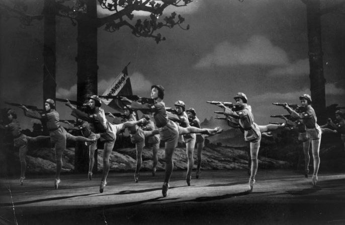 Dancers from "The Modern Ballet of the Revolution" aim their rifles during a scene from a revolutionary ballet performance in Peking, 1971. 