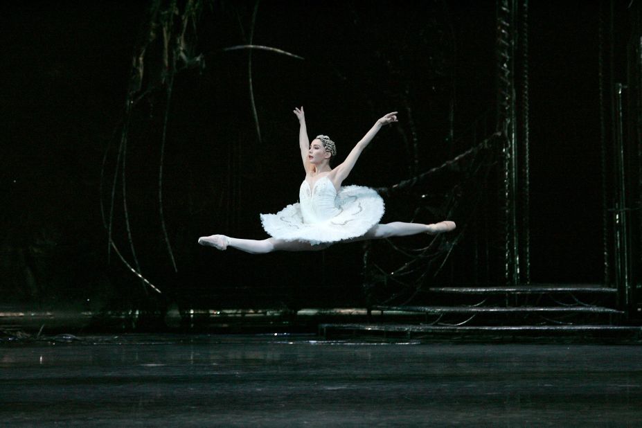 Tamara Rojo has garnered consistent praise for her athletic blend of technique and artistry. Here she is seen mid-flight in the execution of a "grand jeté" during a performance as Odette in Tchaikovsky's Swan Lake.