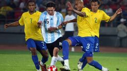 Anderson, left, and his Brazil teammates try to take the ball off Lionel Messi in the 2008 Olympic semifinal against Argentina, who won 3-0 and went on to take gold.