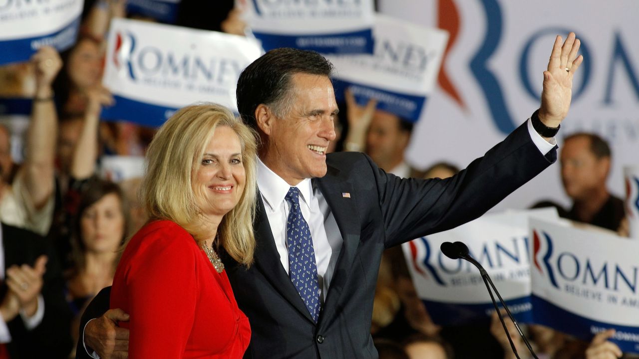 Mitt Romney and wife Ann celebrate his apparent victory Tuesday in the Illinois primary.
