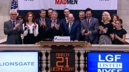 The cast of 'Mad Men' along with Lionsgate executives and exec. prod. Matthew Weiner ring the NYSE Opeing Bell, March 21, 2012.