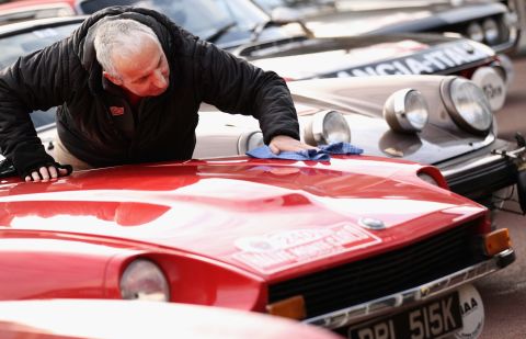 Paul Chilton polishes a Datsun 240z prior to the Monte Carlo Rally on January 27, 2011 in Glasgow, Scotland. 