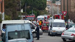 Two officers were injured as police surrounded a property during a raid to arrest 23-year-old Mohammed Merah in Toulouse, France on Wednesday.