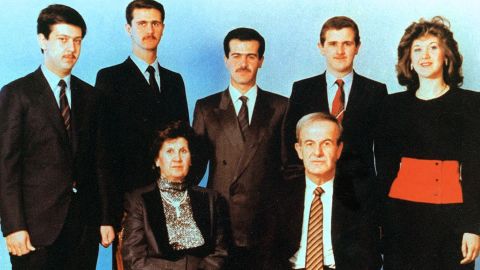An undated photo shows former Syrian President Hafez al-Assad seated with his wife, Anisa. Behind them from left to right are children Maher, Bashar, Basel, Majd and Bushra.