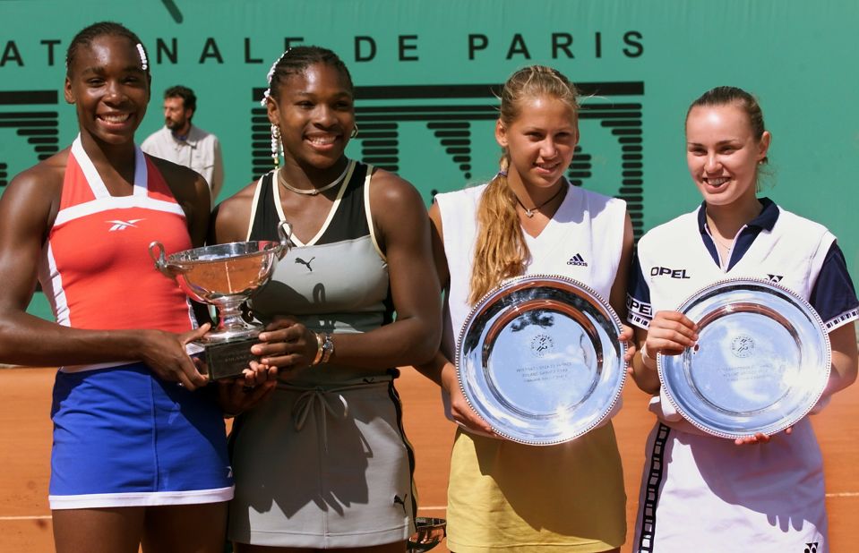 Venus won her first Grand Slam title at the 1999 French Open, winning the doubles tournament with her sister, Serena. From left are Venus, Serena, Anna Kournikova and Hingis. The Williams sisters have had wildly successful singles careers, but they've also been a force as a team, winning 14 Grand Slam titles and three Olympic gold medals. Venus has also won two Grand Slams in mixed doubles.