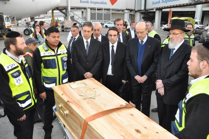 The coffins containing the bodies of the victims of the shooting at the Ozar Hatorah Jewish school arrive at Ben Gurion Airport, Israel from France on March 20. They were buried in Jerusalem on Wednesday.