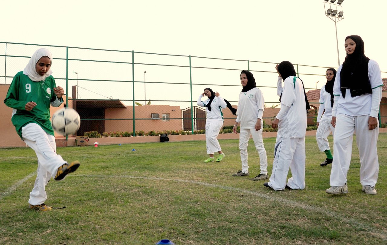 Saudi members of the King's United women's football club train at a stadium in Jeddah. 