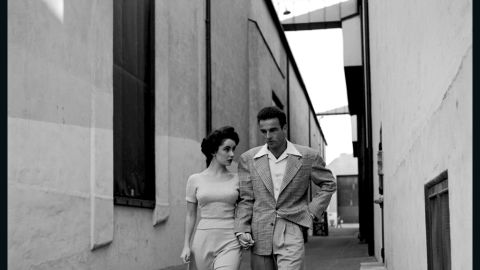 Taylor and Clift's friendship was strengthened after a series of events. In 1956, around the time they were filming "Raintree County" together, Clift crashed his car outside of Taylor's house while leaving a party. Taylor reportedly ran to the wreck and pulled broken teeth from Clift's mouth when he started choking on them, possibly saving his life. Taylor and Clift are shown here walking around the Paramount back lot.