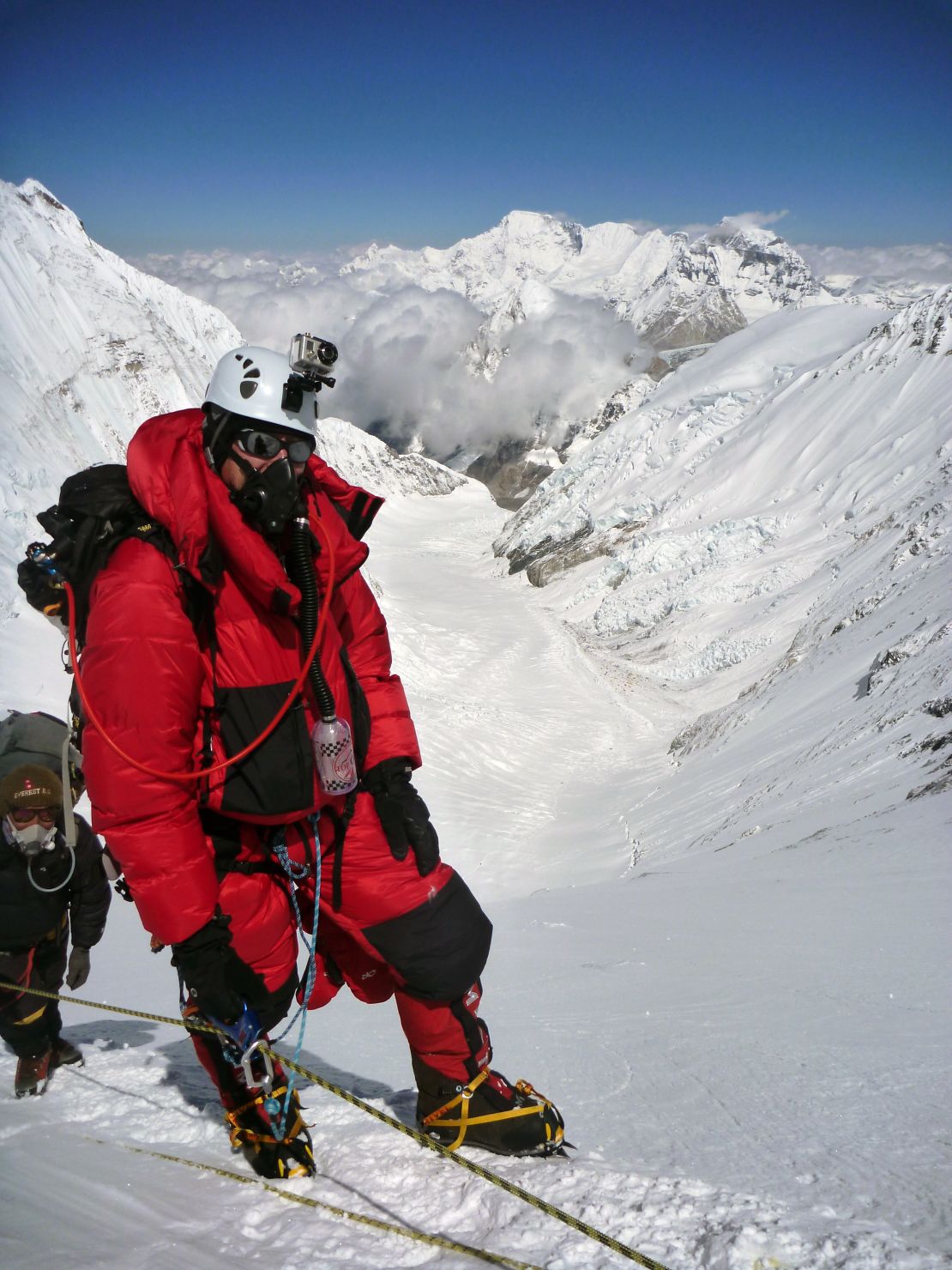 Dellis climbs Mt. Everest in May 2011. Through his charity, he climbs mountains to raise money for Alzheimer's disease research. 