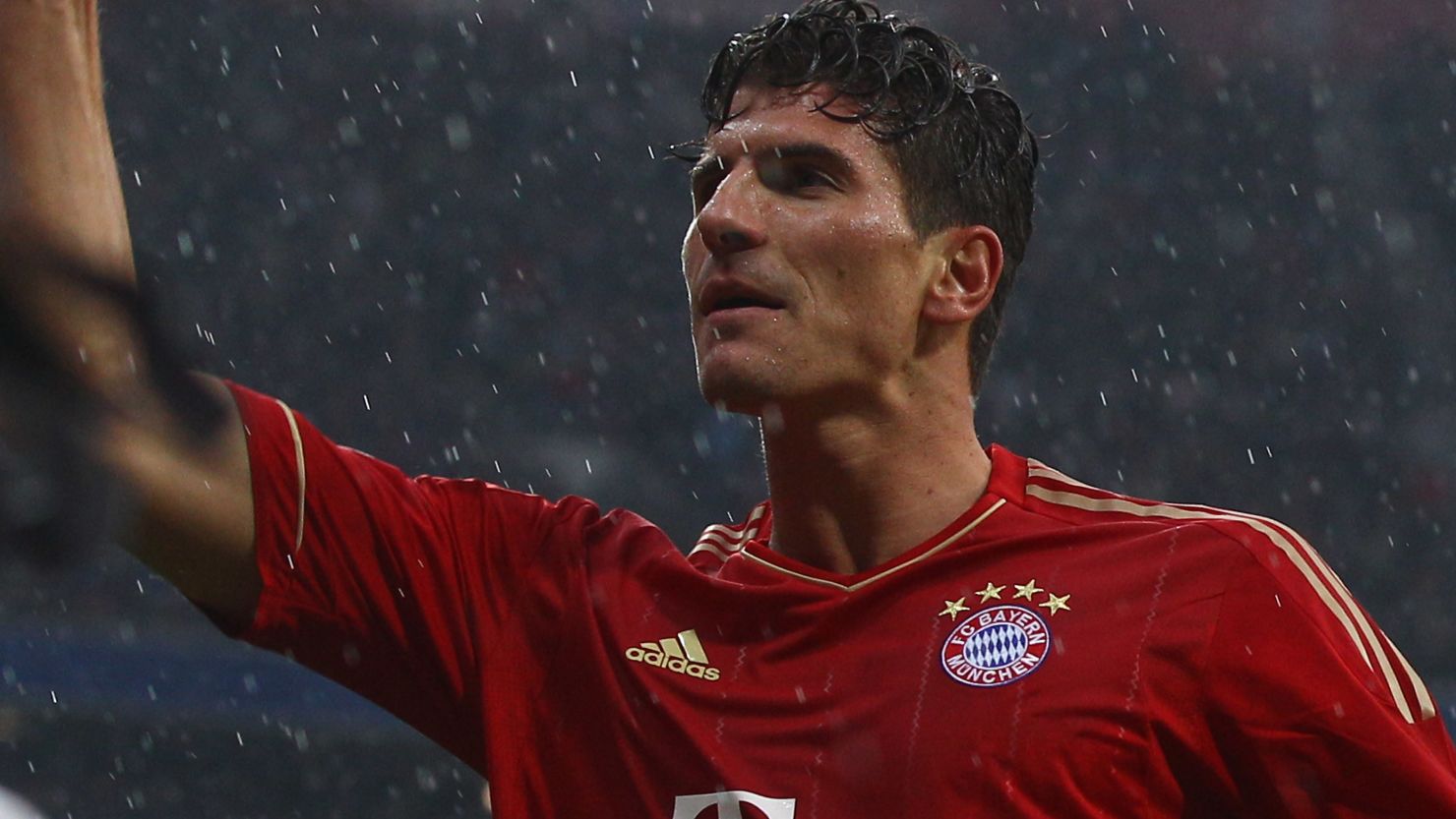Mario Gomez celebrates his goal for Bayern Munich in their 2-1 home win over Hanover.