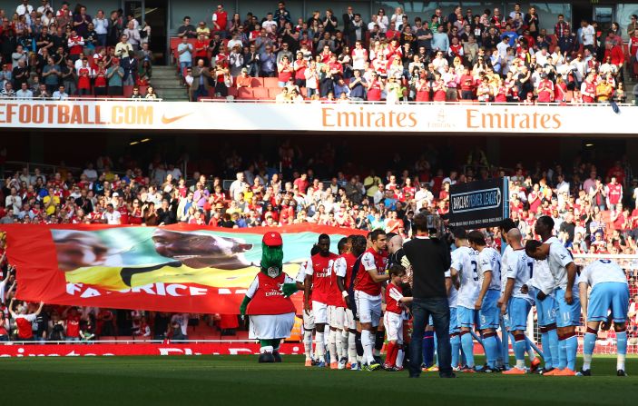 At Muamba's former club Arsenal, a banner showing an image of the midfielder was passed around before Saturday's match with Aston Villa.