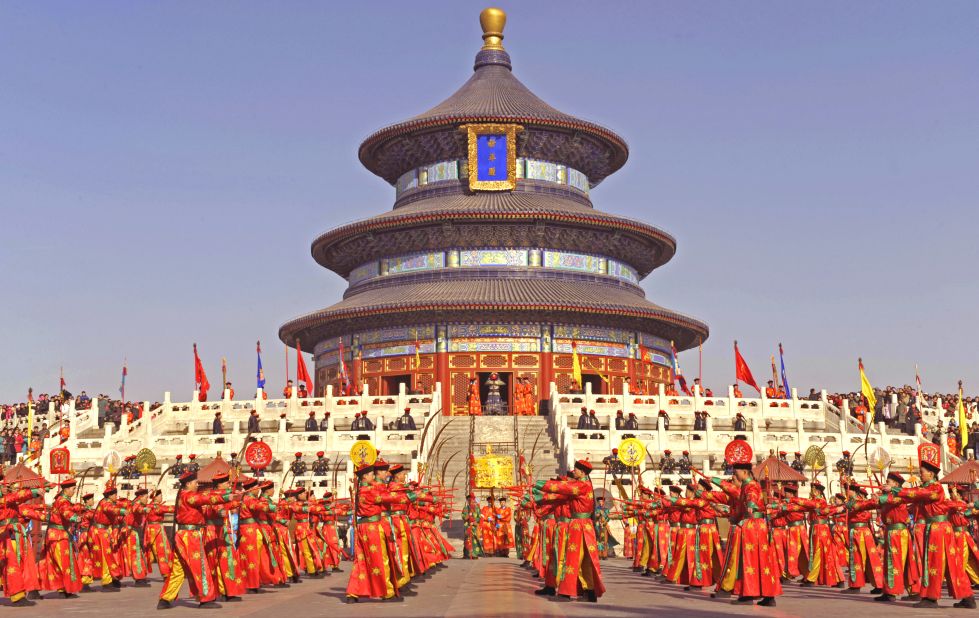 Most tourists know Beijing for the iconic landmarks from its imperial past. Pictured, artists dressed in Qing Dynasty costumes re-enact a traditional ceremony at Beijing's 15th-century Temple of Heaven.