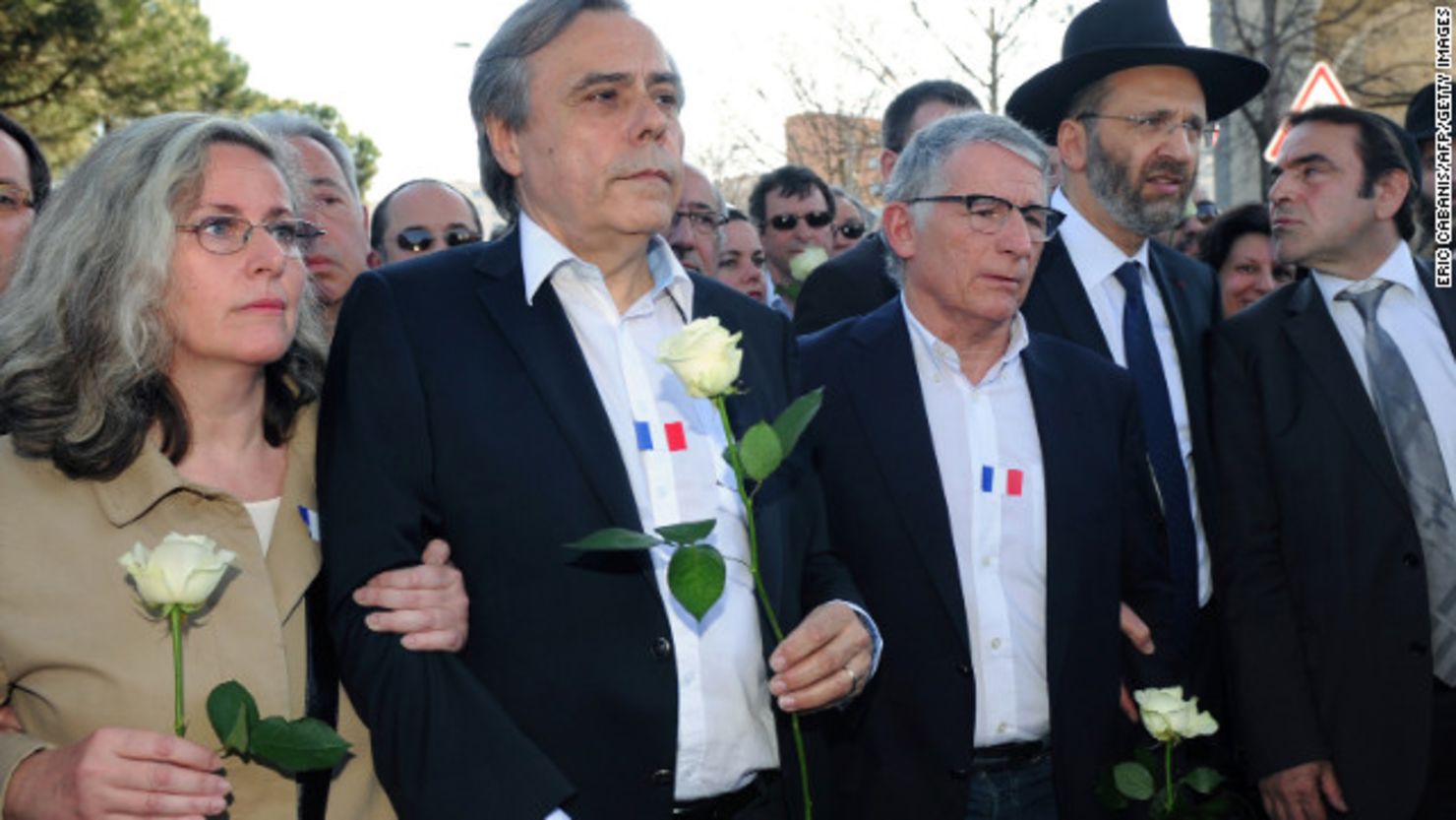Gilles Bernheim, Great Rabbi of France (2nd from right), and others march on March 25 in Toulouse, France where three Jewish children and their teacher were killed.