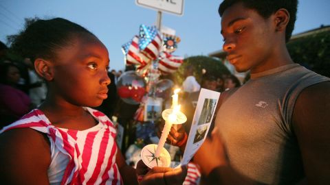  Young supporters hold a candlelight vigil for Trayvon Martin in Sanford, Florida. 