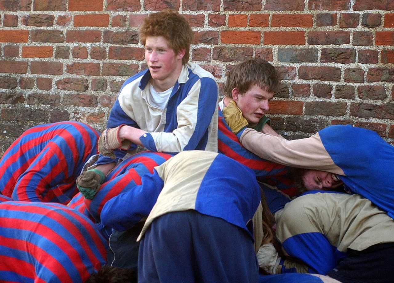 March 2003: Prince Harry plays the Wall Game, a traditional sport at Eton College.