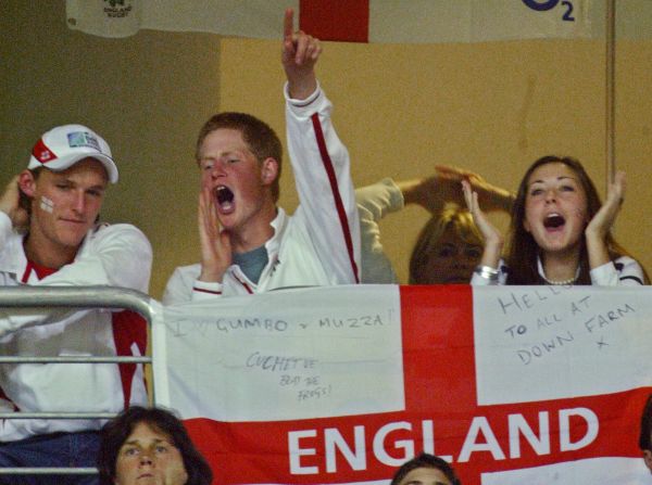 November 2003: Prince Harry celebrates after England won the Rugby World Cup final at the Olympic Park Stadium in Sydney.