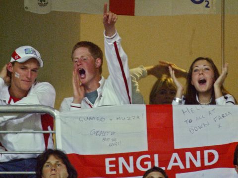 November 2003: Prince Harry celebrates after England won the Rugby World Cup final at the Olympic Park Stadium in Sydney.