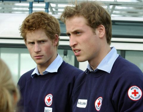 January 2005: Prince William and Prince Harry help out at a Red Cross depot packing aid for victims of the Indian Ocean tsunami.