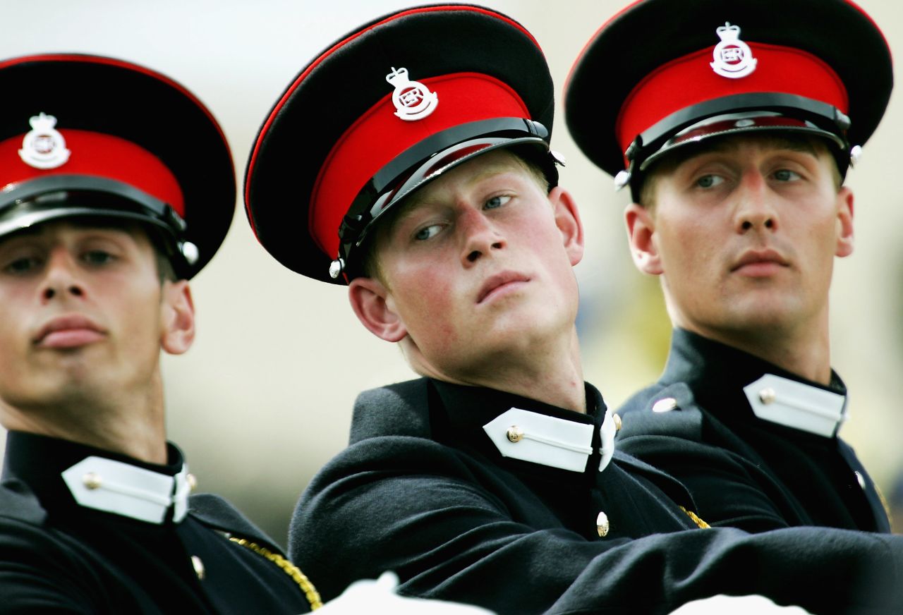 June 2005: Prince Harry takes part in the Trooping Of New Colours alongside his fellow officer cadets at the Royal Military Academy.