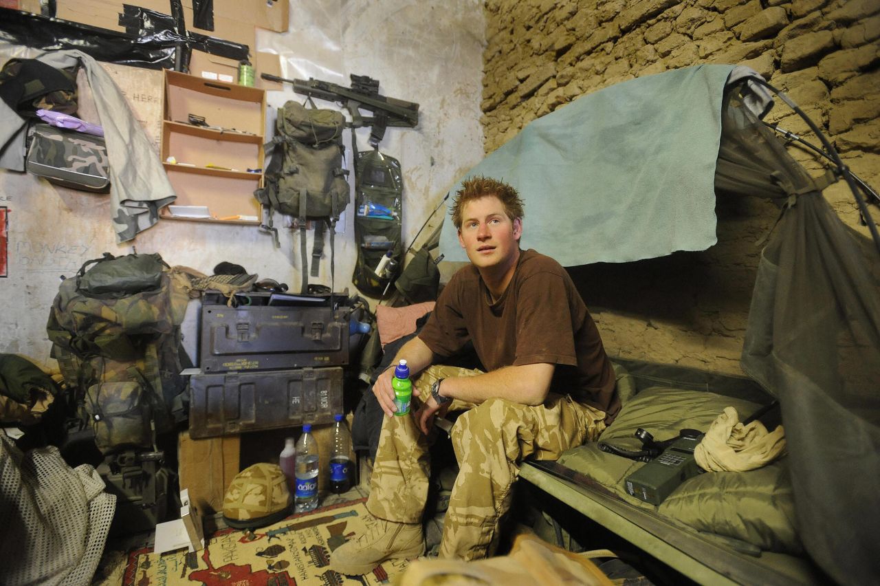 January 2008: Prince Harry sits on his bed at Forward Operating Base Delhi, in Helmand province in Southern Afghanistan. 