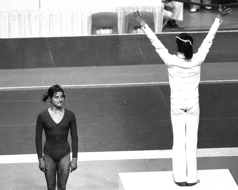 As Comaneci celebrated gold in the balance beam event, her main inspiration Olga Korbut had to settle for a silver medal in Montreal.