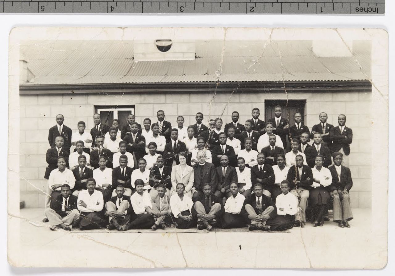 The earliest known photograph of Mandela, believed to be taken in 1938. The future president is fifth from the right in the back row.
