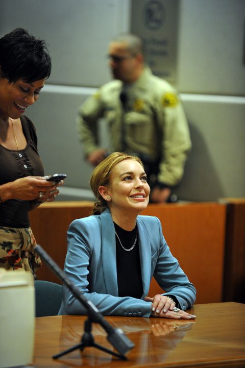 Lohan attends her probation hearing in March 2012 in Los Angeles. Superior Court Judge Stephanie Sautner took Lohan off probation from a 2007 drunken driving case and said that she will no longer have to meet with a probation officer or appear in court on her 2011 shoplifting case, as long as she obeys all laws through May 2014.