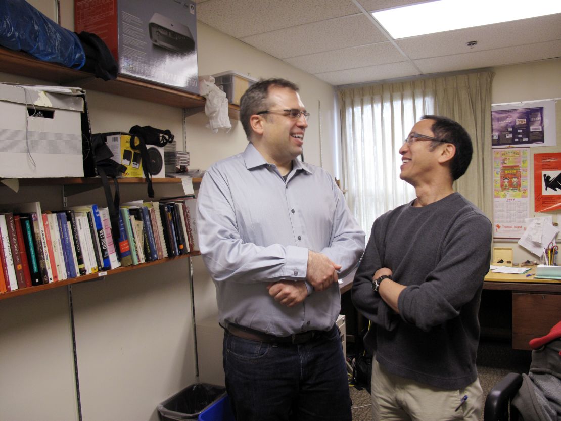 Joseph Sheppard, left, talks with psychology professor Jim Tanaka. The two direct an autism research center at the University of Victoria.