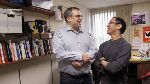 Joseph Sheppard, left, talks with psychology professor Jim Tanaka. The two direct an autism research center at the University of Victoria.