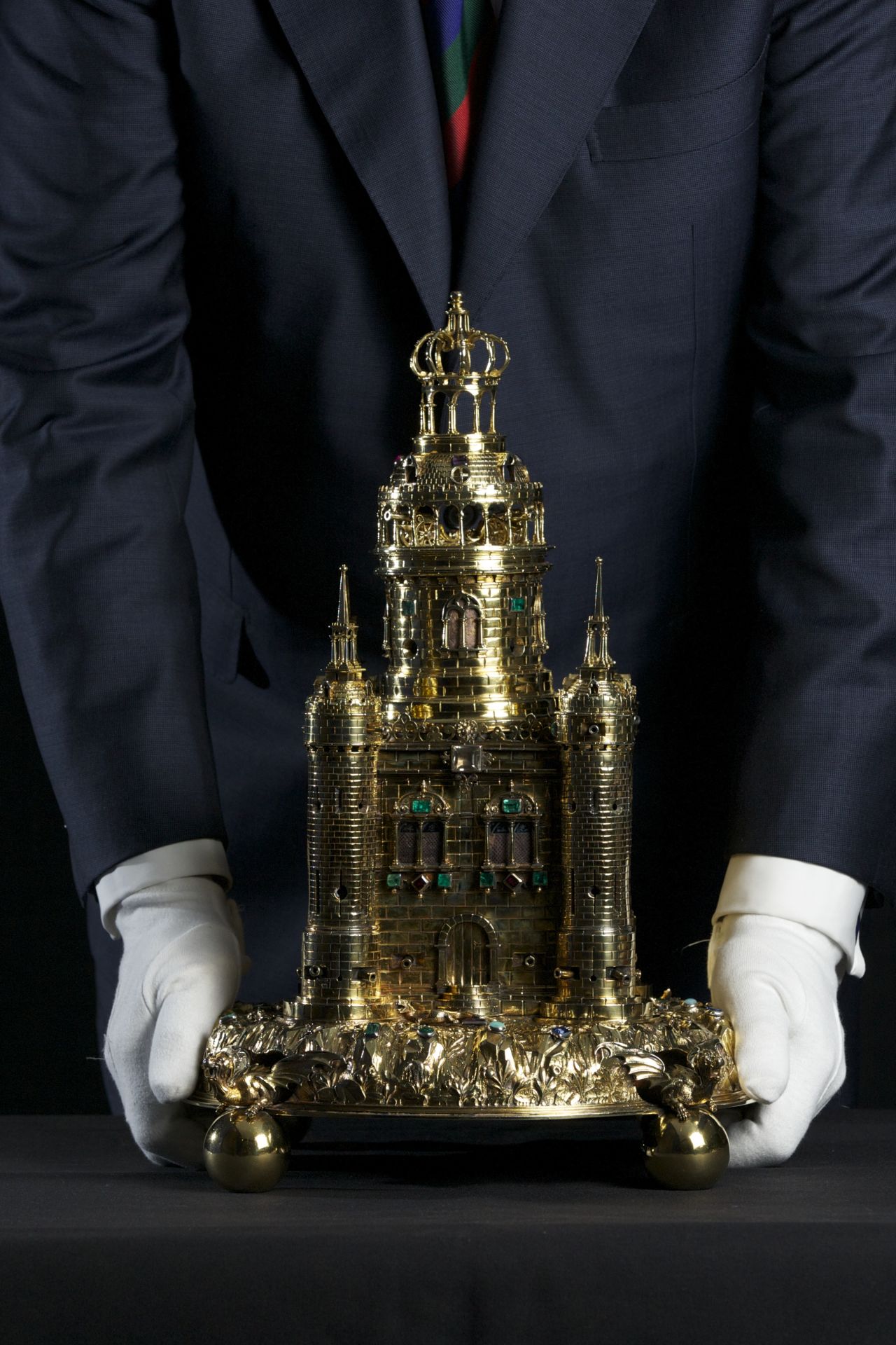 The Crown Jewels collection also contains items created for banquets. This enormous gold salt cellar, in the shape of a castle, was presented to King Charles II after the Civil War by the citizens of Exeter.