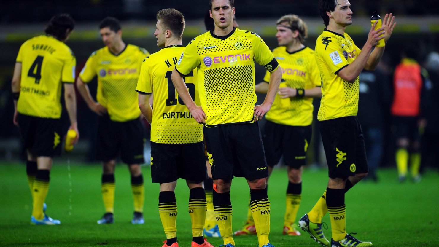 Borussia Dortmund's players react after the end of their 4-4 home draw to Stuttgart in the Bundesliga.
