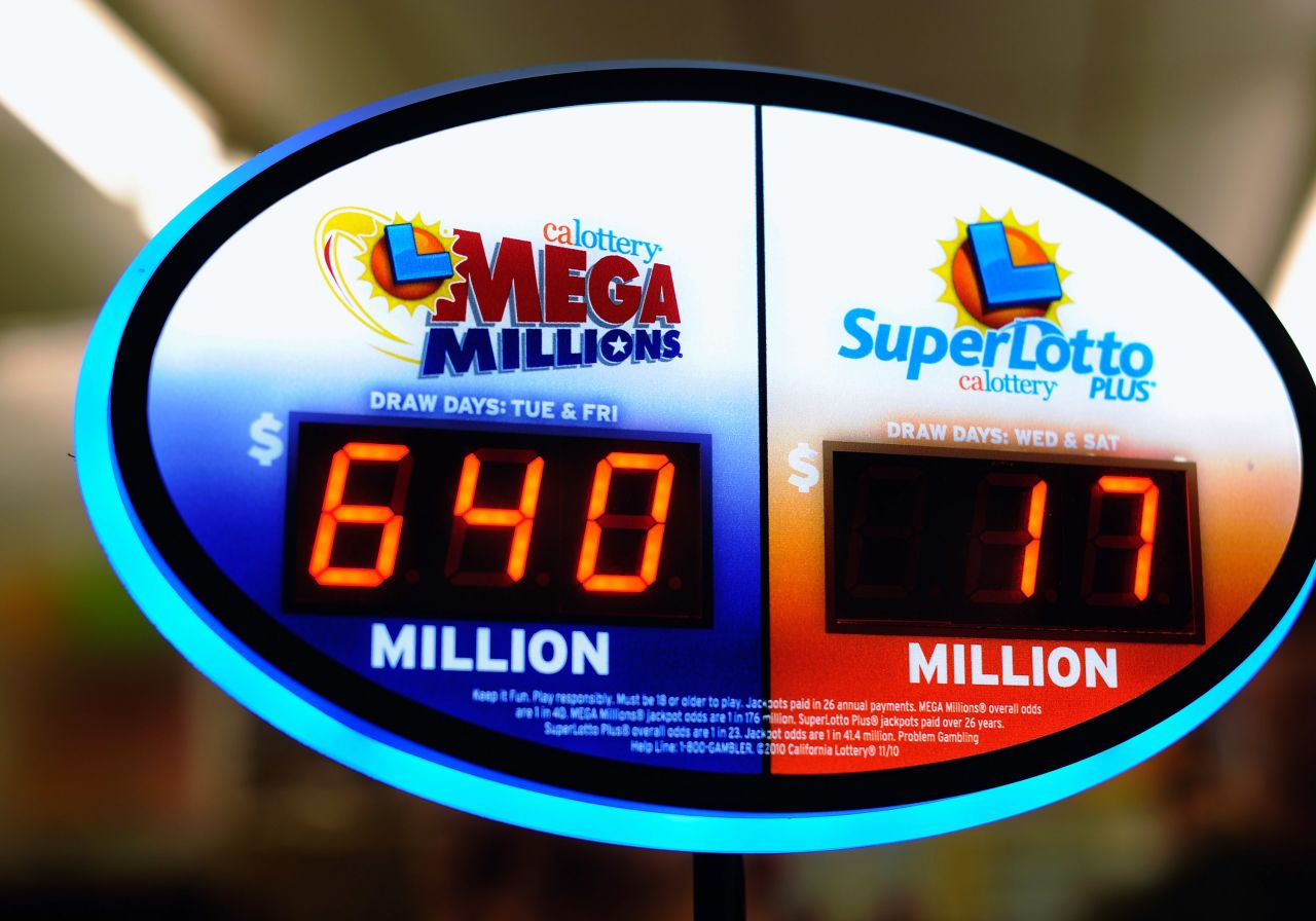The Mega Millions jackpot has reached a record high of $640 million ahead of tonight's drawing as seen here on a Liquorland sign in Covina, California.