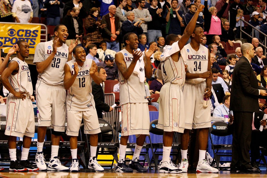 Jonathan Mandeldove (center) cheers during UConn's second-round win in the 2009 NCAA tournament.