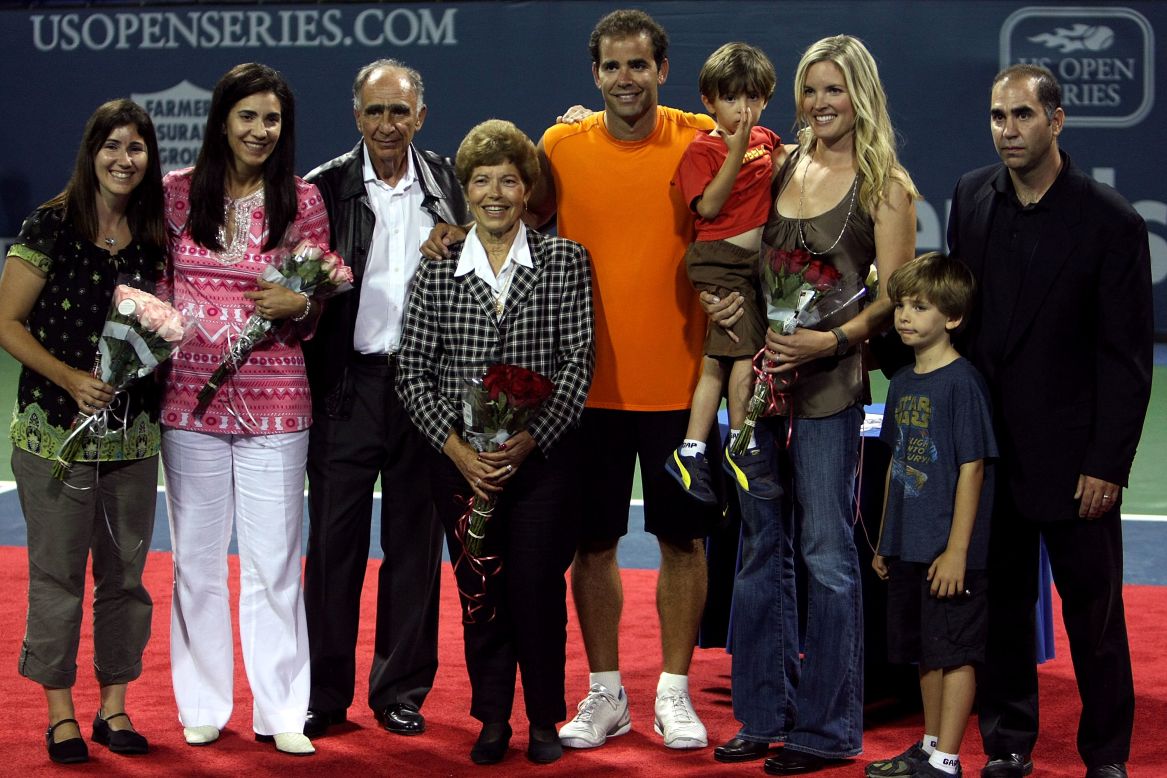 The Sampras clan: (L-R) sisters Marion and Stella, father Sammy, mother Georgia, son Ryan, wife Bridgette, son Christian and brother Gus. Pete was honored at the LA Tennis Open in 2009.