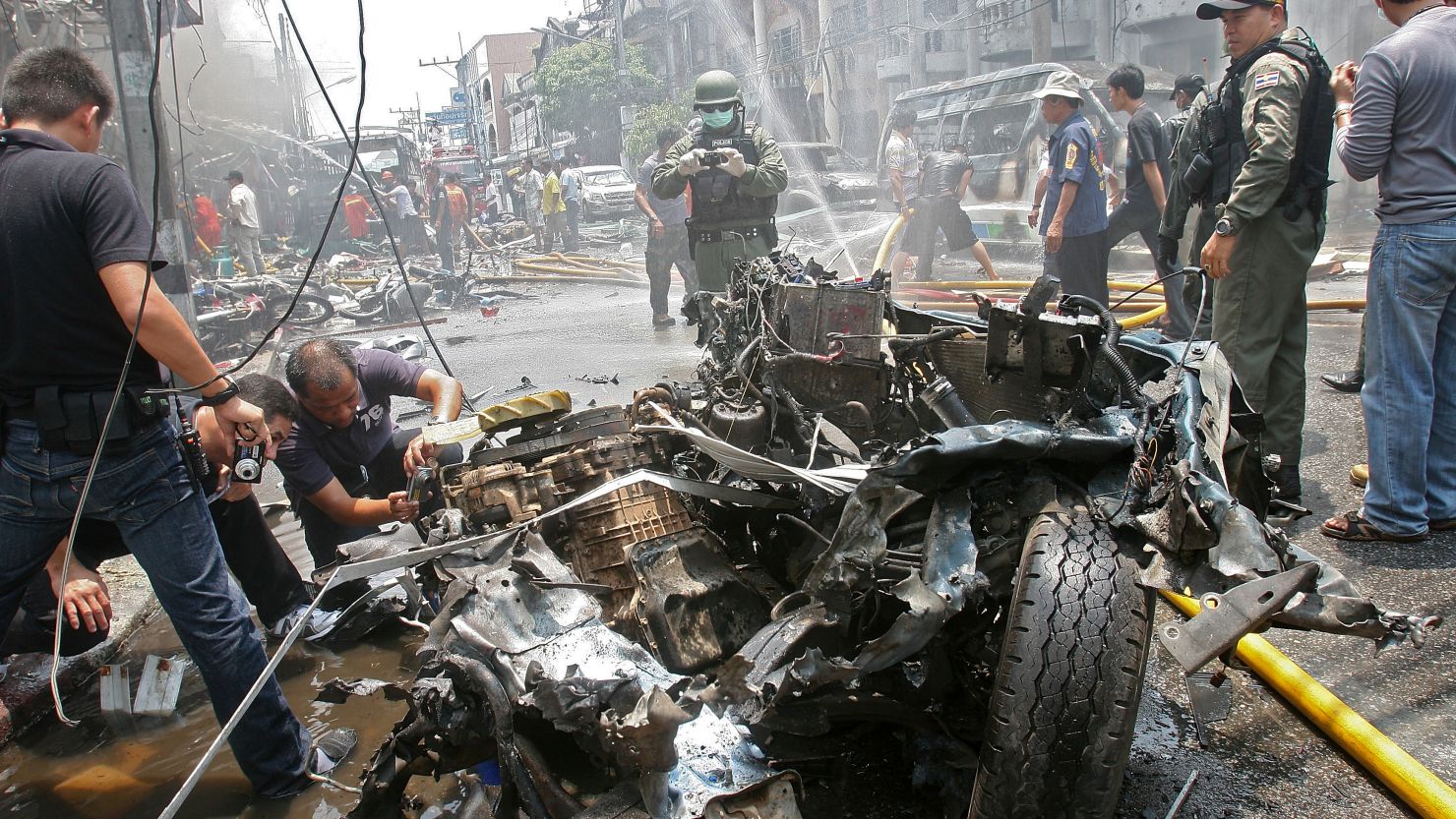 Thai military inspect wreckage from a bomb blast in the southern province of  Yala in this file pic from March, 2012.
