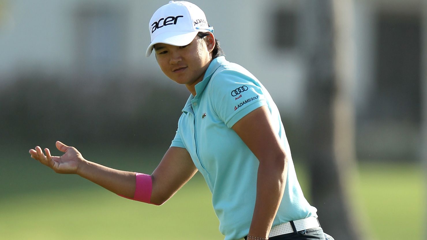 Yani Tseng shows her frustration after a putt fails to drop during her third round 71 at Mission Hills.