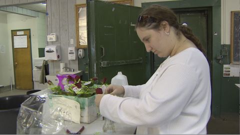 Ethel Bondi possesses a talent for making dried rose wreaths -- one of the farm's best sellers.