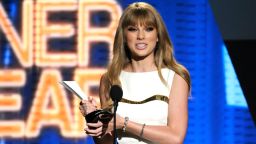 Singer Taylor Swift accepts the Entertainer Of The Year Award onstage at the 47th Annual Academy Of Country Music Awards Sunday night in Las Vegas.
