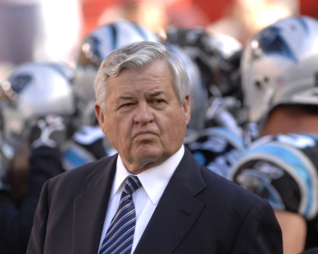 Though the Carolina Panthers owner had a short NFL career, it was a memorable one. As a Baltimore Colt, he caught a touchdown pass in the 1959 NFL championship game, the Colts' second straight title. And then, upset with his contract, he walked away to open a fast-food restaurant named Hardee's. More than 30 years later, a millionaire many times over, he bought into the NFL.